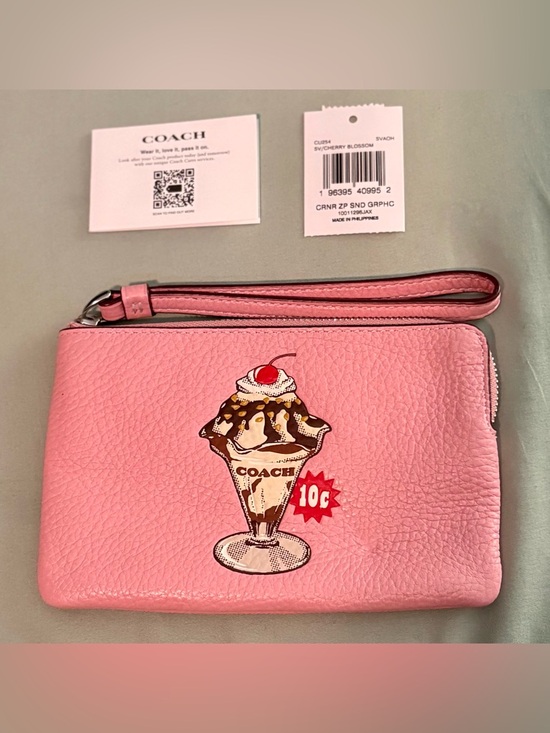 Coach Handbags - Coach Corner Zip Wristlet With Sunday Graphic